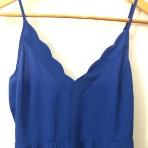 Lush blue scalloped romper. Size M